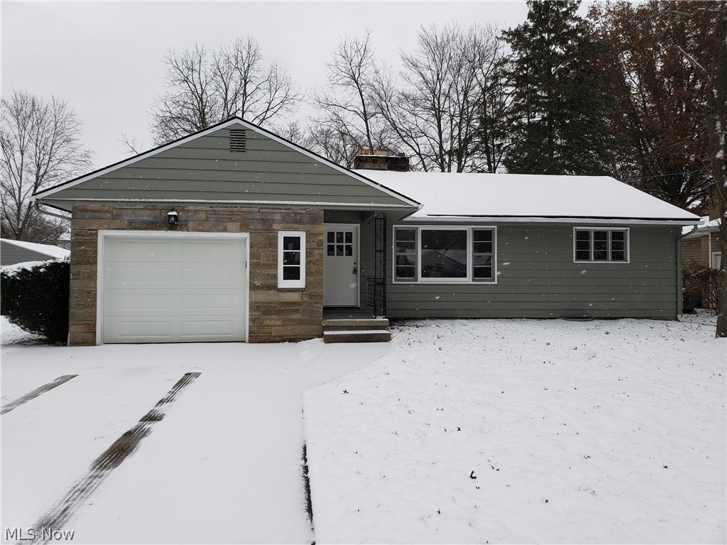 Darling 2 bedroom, 2 bathroom ranch with all new flooring and paint! New gorgeous kitchen with tile backsplash and stainless appliances. Remodeled main bathroom with tile! Downstairs bathroom is new too! 2 fireplaces! HUGE recreation room. Fantastic location close to parks, dining, shopping and schools!