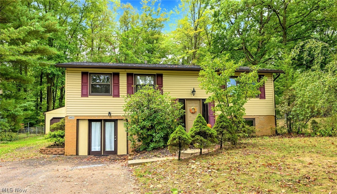 *WELCOME HOME To This Remarkable Bi-Level In Norton On Lullaby Lane In The Desirable Melody Village Neighborhood! *2,080 Sq. Ft. Includes 4 Bdrms, 2 Bathrooms - Upper & Lower Finished Walkout Level! *Oversized 2 Car Detached Garage W/Liftmaster Keypad, Shed, 3/4 FENCED IN YARD On .33 Acres! *Relax And ENTERTAIN On The NEW 2021 Large DECK Which Spans Almost The Entire Back Of Home! *Major Updates Include: LUXURY Plank Flooring 2022, New FURNACE and CENTRAL AIR 2016, Main Bathroom Updated Tub/Shower/Flooring & MORE *Walk In To A Foyer W/10 Ft Ceiling *Upstairs Is The Main Living Rm W/Hardwood Floors & Walls W/White Beadboard Accents *The Dining Rm Features A New Modern Remote Controlled Hunter Ceiling Fan & Door To The New Back Deck *Kitchen W/Appliances, Above Sink Track Lighting & Cabinets W/Lazy Susan *3 Bdrms Main Floor Include 1 W/A Remote Controlled Ceiling Fan & Another W/Dimmer Light ~ Cozy Carpet *Full Main Floor Bathrm Boasts LUXURY Plank Flooring, Built in Linen Closet + Vani