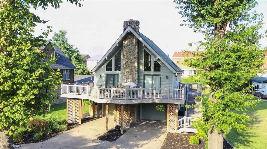 Spacious A Frame features Cathedral ceilings, 1 1/2 story 28x13 fireside Great room, New kitchen cabinetry and appliance package. Loft style owners suite and two guest rooms. Upgrades include new windows, engineered hardwood flooring, new carpeting, new interior painting, new gas lines, new interior doors and trim. 40x20 composite decking, two (2) car garage and 28 feet right of way to the river.