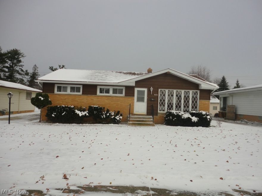 Cozy Ranch * Vaulted Living Room *  Fresh paint throughout * 1/2 Bath between Master and Kitchen hallway * Newer vinyl windows * Vinyl siding with a partial brick front * Updated electrical * Basement has a sink and shower * Extra large 2 car detached garage * Newer extra wide driveway with tons of  parking * Anchor wall system with transferable warranty * Newer three dimensional roof *.