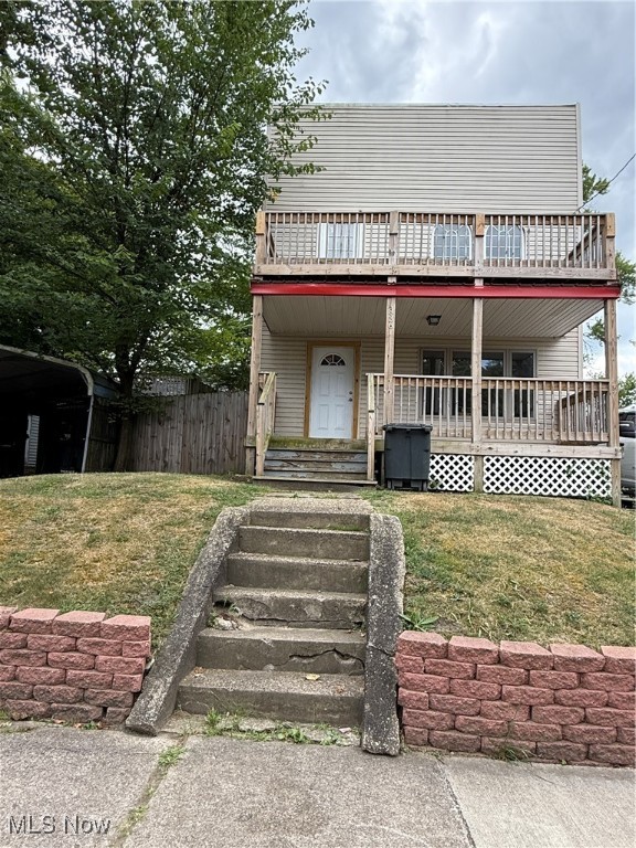 This two-unit property offers duplex style living 2-bedroom, 1-bath units with many updates already completed—just add your finishing touches to make it your own. Recent improvements include updated kitchens and baths, new flooring throughout most of the home, also replaced many vinyl windows. The basement features a rebuilt block wall, freshly poured leveled concrete floor, and two updated electrical panels. Additional upgrades include two new hot water tanks, a new metal roof, and a newly sided garage, upper and lower decks in front of the property. Look at the supplement for full list of updates.
Conveniently located near highway access, Goodyear, and Firestone plants. Don’t miss your chance to own this versatile property—schedule your showing today!