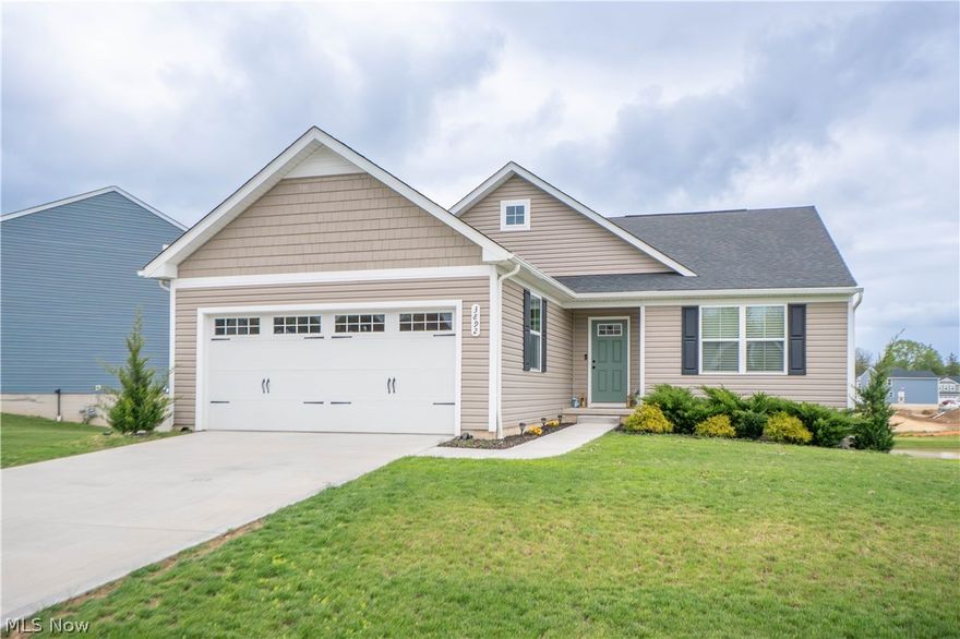 Welcome to this beautiful Ryan Homes Tupelo floorplan in Brookside Greens, built in 2023 and offering easy one-floor living with modern finishes throughout! Step inside through the welcoming foyer entryway with convenient closets, where upgraded LVP flooring flows through the main living spaces. Just off the foyer are two comfortable bedrooms and a full bath with a tub/shower combination, creating a functional layout for guests and family, or a home office! The heart of the home opens into a bright and spacious living room and eat-in kitchen, featuring a pantry, large kitchen island with breakfast bar seating, quartz countertops, stainless steel appliances, and a gas stove. Sliding doors lead to a private Trex deck overlooking the backyard and peaceful pond view, perfect for relaxing or entertaining. The primary suite offers a walk-in closet and private bath with dual sink vanity and standing shower. A first-floor laundry room adds everyday convenience, while the unfinished walkout lower level provides excellent storage and future finishing potential. Enjoy an attached 2-car garage, front porch, and a great community setting with Brookside Greens clubhouse, pool, and playground all within walking distance!
