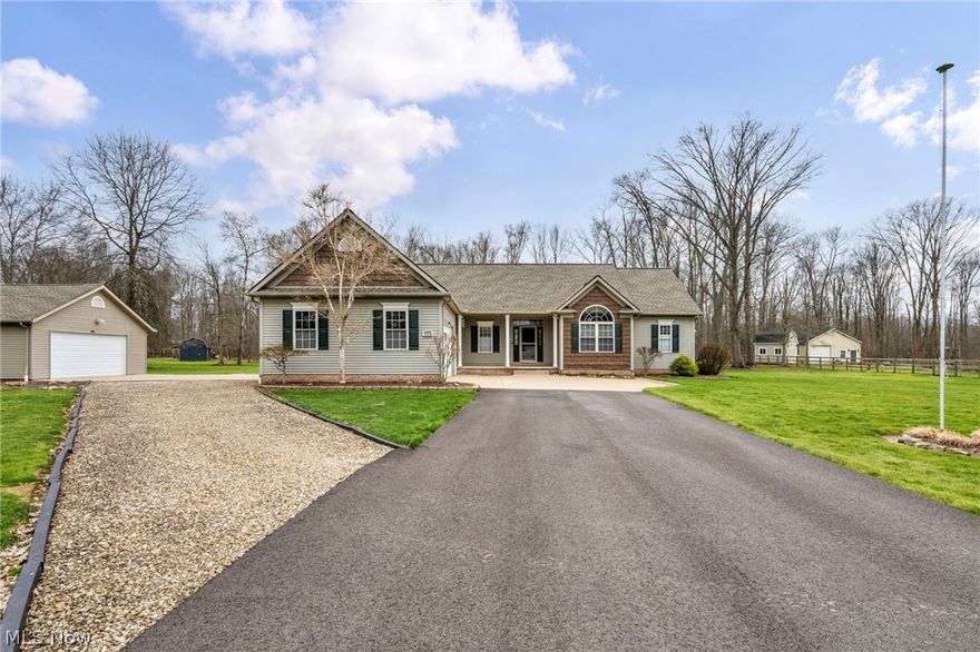 Rare opportunity! Stunning ranch built in 2003 and meticulously maintained, offering over 2,000 sq ft of finished living space on the main level plus approximately 2,000 sq ft in the finished lower level—nearly 4,000 sq ft total—set on a beautiful park-like 2+ acre property in sought-after Aurora.
The open-concept design is built for today’s buyer, featuring a spacious living room/dining room combination that flows directly into a beautifully updated kitchen with maple cabinetry, granite countertops, stainless steel appliances, ceramic tile backsplash, and a breakfast bar overlooking the dining area. Dual sliding doors lead to a massive deck—ideal for entertaining—overlooking the private backyard and large storage shed.
The main level features a spacious owner’s suite with a walk-in closet and a glamour bath complete with granite countertops, double sinks, garden tub, and walk-in shower. Two additional bedrooms, a full guest bath, and a convenient first-floor laundry room complete the main level.



The finished lower level dramatically expands your living space with a huge recreation room perfect for entertaining, plus a bonus/flex room ideal for a home office, gym, or guest suite.



Car enthusiasts and hobbyists will love the attached 3-car garage PLUS a detached 2.5 heated and air-conditioned garage—perfect for additional vehicles, workshop space, or all your toys.



Major mechanical updates include a newer furnace (August 2020) & A/C (August 2019), three newer sump pumps (within the last 2 years), and a roof replaced in 2009.



Located in the highly desirable Aurora School District, this property combines space, privacy, and top-tier location.



Opportunities like this don’t come around often—schedule your showing today before it’s gone!
