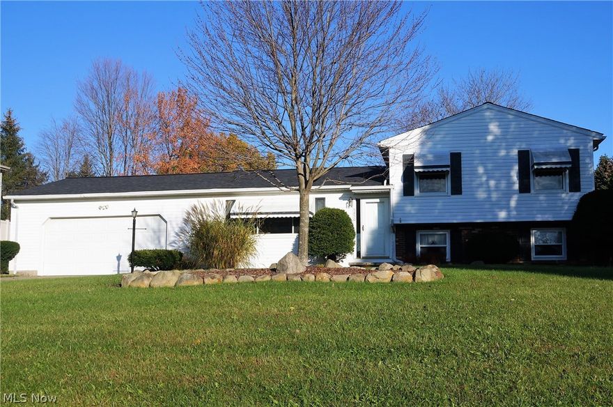 Come on home to 5450 Lakewood Rd! This great split level is on the market and ready for you to call it home. Nice size
living room. Dining room has a slider that opens to a beautiful sun room over looking the back yard. Walk out on to the
patio and put your feet up around the fire pit. This home also has a detached garage for extra storage along with a 2
car attached garage. Upstairs you will find 3 bedrooms, a full bath and the lower level offers a family room, half bath
and utility area that has a walk out to the back yard. All this and close to the lake for fishing or boating, Kent State and
NEOMED. Check it out today and make it yours.