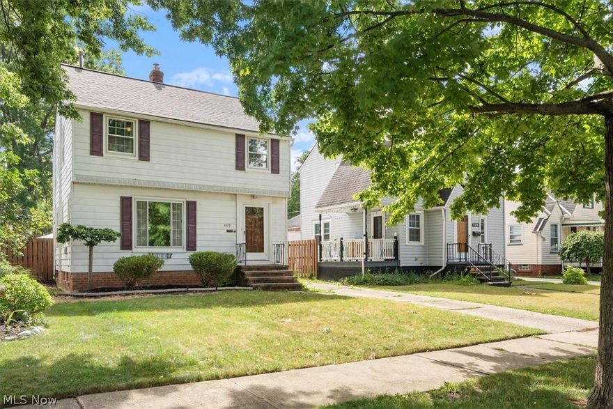 Welcome to this bright and cheery West Park colonial with two car detached garage with remote control entry and fully fenced yard (sans the driveway) that is tastefully updated top to bottom, move in ready and well-priced! Throughout this lovely home are lustrous hardwood floors, updated windows and renovated kitchen and baths! The home has three access points: handsome wood doors in the front and side entries and sliders to the rear yard.  The inviting kitchen offers an abundance of updated glazed cabinetry, a new oven and microwave, SS dishwasher, and fully functional refrigerator.  It adjoins a formal dining room with sliders to the rear yard and patio that are flanked by twin decorative shelving, and this expansive room seamlessly leads to an equally expansive living room.  The front entry with petite foyer & coat closet leaves a favorable first impression as it views arched entryways and coved ceilings - charming appointments that make this home special.  All three bedrooms are located upstairs and feature well proportioned closets; the smallest bedroom features bonus steps to surplus storage in the unfinished attic. The full upstairs bath is tastefully updated with ceramic tile flooring, an attractive vanity and twin coordinating light pendants, a floor to ceiling linen closet, and an updated shower surround. Newer mechanicals and a full finished rec room with recessed lights, glass block windows and ceramic tile flooring await the new owners in the 576-square foot lower level, where there is a convenient half bath and plenty of room to lighten your laundry routine. Washing machine and dryer remain.  This home is attractively located in a timeless and ultra-convenient neighborhood which offers ready access to I-71, I-90 and a five minute drive to every conceivable amenity, whether it be groceries, gas, retail or restaurants. Come see and appreciate the Seller's ongoing maintenance and vigilance with this special property!  You won't be disappointed.