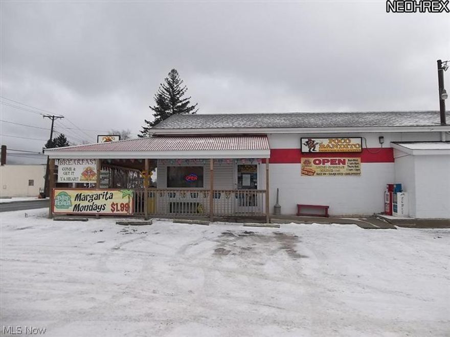 Prime location for restaurant. Tables, chairs and bar stay. 19,166 sq ft building with newer furnace and hot water tank. Electric/ plumbing, 2 commercial freezers. All equipment stays. Ceiling fans, large windows across all dining area. Only Restaurant in the east Conneaut area. D6 liquor license.