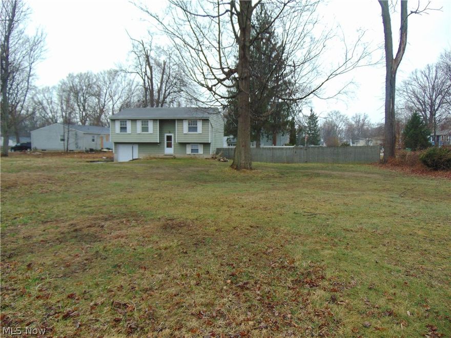 Well maintained and updated Madison Bi-Level featuring 3 bedrooms and 2 full baths situated on a double lot***Upper level offers kitchen with dining area, spacious living room, full bath and 3 bedrooms***Lower levels offers a great family room with w/w carpeting, 2nd full bath, laundry area and a small office area***Electric panel, flooring, light fixtures, interior paint and bathrooms all updated/new 2026***Kitchen updated within the last 5 years***Furnace with c/a 2024***Hot water tank 2024***Roof 2009***2 new sump pumps 2026 (one in lower level & one outside by front of garage)***Includes separate parcel PP#01B112A170480, corner of N. Watling Way and Sterling