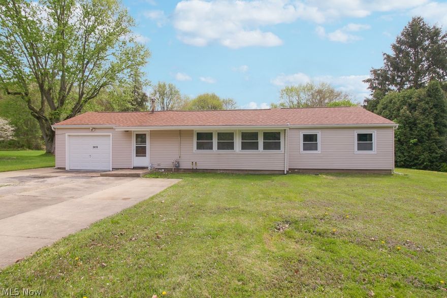 Welcome Home! One Floor Living at its Finest. Must See Ranch Home on almost a Full Acre Property. Absolutely Huge Eat-In Kitchen (18' x 17') where the Possibilities are Endless. Sliding Doors in Kitchen Lead to Large 4 Season Room w/Wrap Around Window View of the Expansive Yard. Through the Living Room are 2 Enormous Bedrooms. Master Bedroom is at Front of Home, and Original 2nd & 3rd Bedrooms have been Combined into one Large Bedroom (20' x 12'). Original Garage off Kitchen is 3rd Bedroom, w/Added Garage Added Later. Kitchen Appliances Remain. Updates Include; RUUD Furnace & A/C (2017), Roof (2007), Blown-In Wall Insulation (2007), Exterior Siding (2007), Attic Insulation (2007), 3 Car Wide Driveway w/Turnaround. Laundry Hookup in Kitchen, Washer/Dryer do Not Stay. One Year Home Warranty Included.