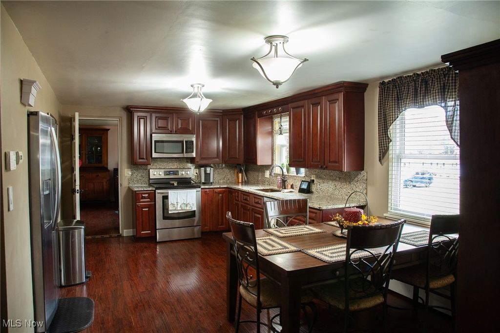 Photo of 8304 Sharon Avenue NW, North Canton, OH 44720 (MLS # 5176249)