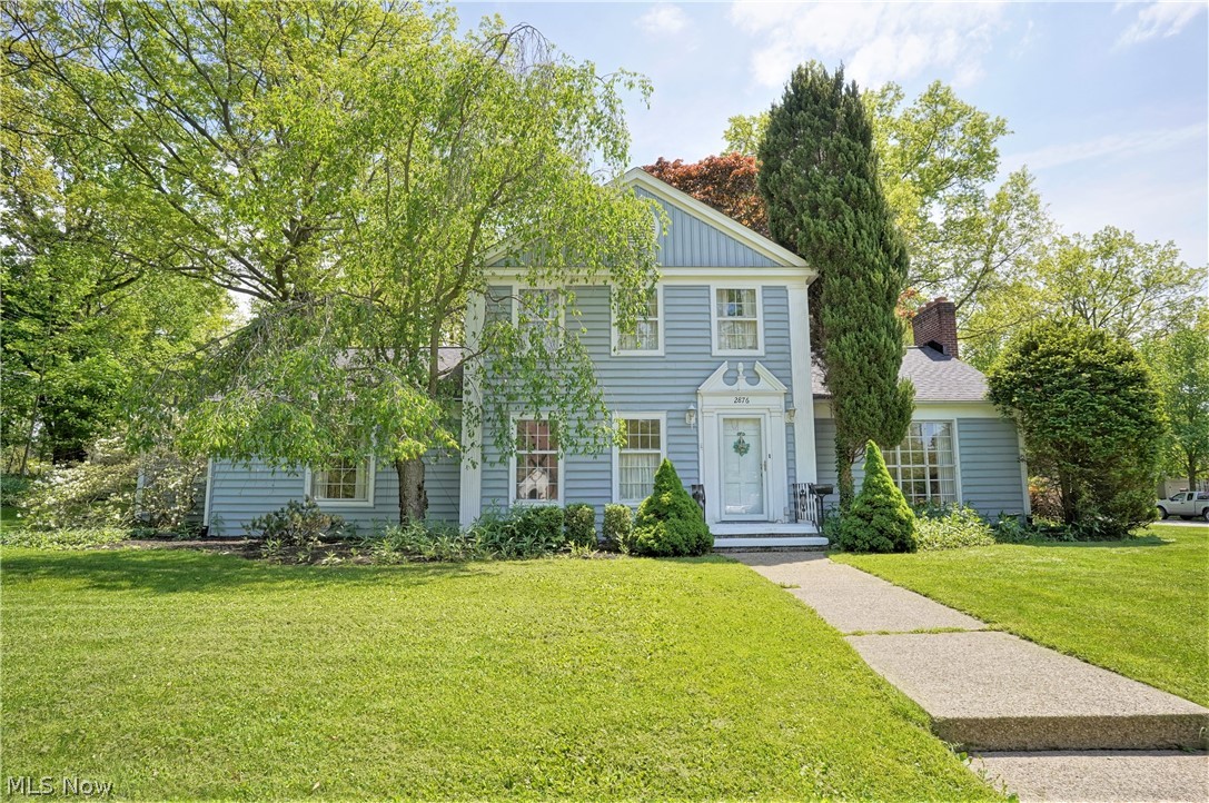 Beautiful, charming home full of character in Silver Lake Estates with lake privileges! First floor additional living suite - large bedroom with 3 closets, kitchen & full bath with walk in shower. I can visualize this area being used as an amazing master ensuite with the kitchen being the coffee/beverage area w/ sitting room or incredible bath with walk in closet & there's even a door to the private patio. The grand foyer leads you into the spacious living room w/ crown molding, large windows to bring in an abundance of light & gas fireplace. The formal dining room with built in hutch is nice for entertaining. The kitchen is gorgeous and was updated last year with white KraftMaid soft close cabinets and drawers, beautiful counters, backsplash, tile flooring & recessed lighting. All appliances convey & were replaced with the renovation except the dishwasher. An office/2nd bedroom, full bath and powder room complete the first floor. You will find 3 additional bedrooms with built i