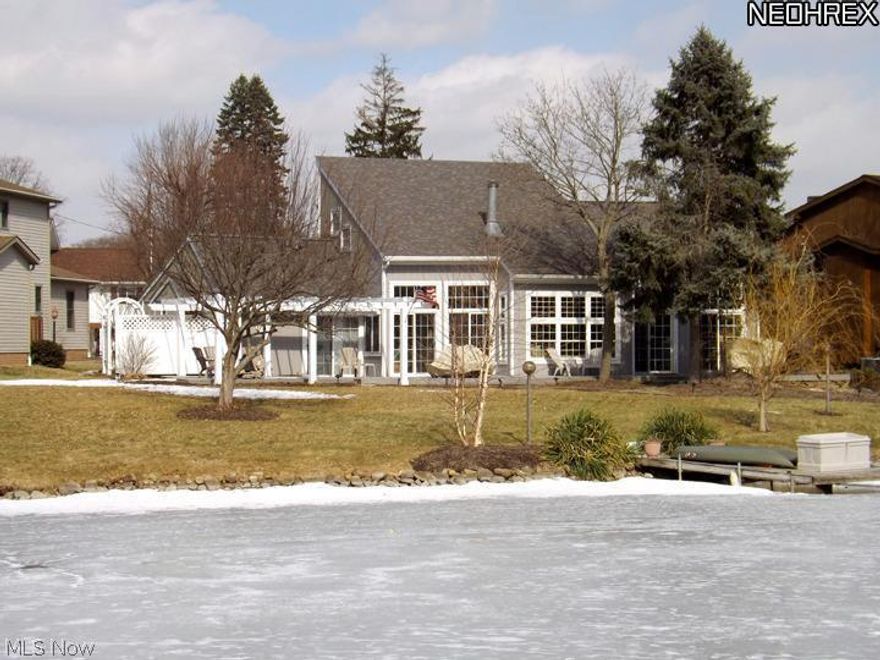 Absolute auction. Sells to highest bidders on location: SATURDAY - APRIL 5, 2014 - 10:30 AM - Real Estate sells at 11:00 AM - Nice contemporary 3-bedroom home with second level loft. Built in 1981 having 2,214 sq. ft. of living area. Attached 2 1/2 car garage. Approx 140' lake frontage w/private dock.  You'll love this paradise on the lake! Call Bill for more info or showing.  TERMS ON REAL ESTATE: 15% Down Auction day, balance due at closing. Any desired inspections must be made prior to bidding. All information contained herein was derived from sources believed to be correct. *Joining the Lake Cable Recreation Assoc. is optional. To use the lake and join the assoc. the initiation fee is $1800, dues are $875 per year, boat sticker is $10 per year, fireworks fee is $30 per year.