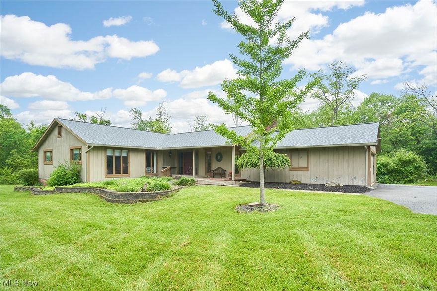 Wonderful ranch with walk out basement and so much potential. One owner home, is waiting for the next family.  Don't miss this great investment. 3 bedrooms ,2.5 baths with a tiled foyer. The Living Room has wood floors, crown molding and slider to a small wood deck. The dining room is off the Living room with wood floors. There is a galley kitchen that is located between dining and family room. The eating area is near the family room. The family room has the same tiled floor that the kitchen has, and a full wall brick wood burning fireplace, with a slider that leads to a 1200 two tiered deck , plus gazebo. This home has great space for entertaining or family. The master ensuite has a walk in closet and a 14 x8 master bath just waiting to be remodeled.  The other 2 bedrooms have windows that go to the floor and double closets, This home has great views and sunshine from every window. There is an open staircase that leads to over 1200 sq ft of finished walk out basement. There also is great storage area where the laundry is locate and is plumbed for a half bath too. Outside in the back corner of the lot is a lofted outbuilding. It is vinyl sided and the roof was replaced in 23- But there is not electricity and only a dirt floor. The back yard is private with woods in the back and great yard space.  The roof was a tear off in 2025 with new gutters too!. The home has already had a POS. it is in the supplements. This home is a diamond in the rough and to be sold in "as is" condition.