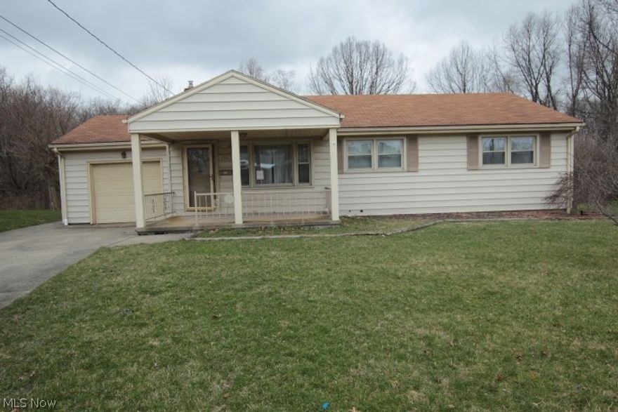 Vinyl sided, 3 bedroom, 2 bath. 1 car attached garage. kitchen & bath w/ceramic floors. Finished rec room in basement w/bar. Property was built prior to 1978 and lead based paint potentially exists.