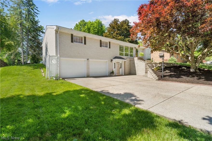 Charming white brick ranch with open concept floor plan and generous natural lighting, located in Jackson Township. This 3-bedroom and 3-full bathroom home provides for a fun and comfortable living space. Master bedroom has full-bath and large sliding closet doors for your entire wardrobe. Snuggle up next to the cozy fireplace when the weather gets cold and stay cool in the 4-season room during the warmer months. Enjoy grilling out as well as hosting friends and family all summer on the spacious deck that walks out into the backyard with storage shed. The basement offers a year-round space for entertaining with bar and large recreation area. Basement has laundry room, full bathroom, and leads to attached 2-stall garage with loads of storage space and built-in workbench.