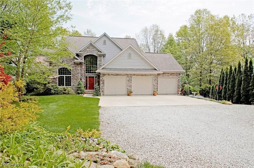 Now is the time to plan a permanent stay-cation with your very own lake house! No need for even a fishing or boating license when you have your own private access. This beautiful, Paul Yoder custom-built home with private, stocked Lake Lucerne access and views on a partially wooded 1+ acre lot was built in 2003 and features 3-4 bedrooms, 4.5 baths. The foyer of the home invites you straight in to opulence with a custom staircase and Italian porcelain tile. First floor master bedroom and bath. Recently updated kitchen with quartz countertops, limestone backsplash and bar top, and stainless steel appliances.  First floor laundry room for easy accessibility. Relax on your choice of two lakefront decks and two brick-and-stone patios. Three car garage with electric openers and LED lighting and stairs leading to the basement. Large, finished walk-out basement and custom storage barn allow for extra storage. One half mile from Northwest Schools complex.