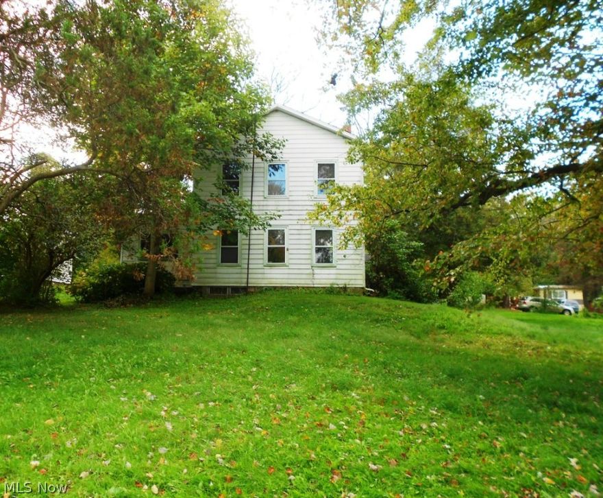 What a buy! Owner says sell it. Four bedrooms, livingroom, kitchen, family room, beautiful lot with 2 car garage. Lots o opportunity with this affordable home!