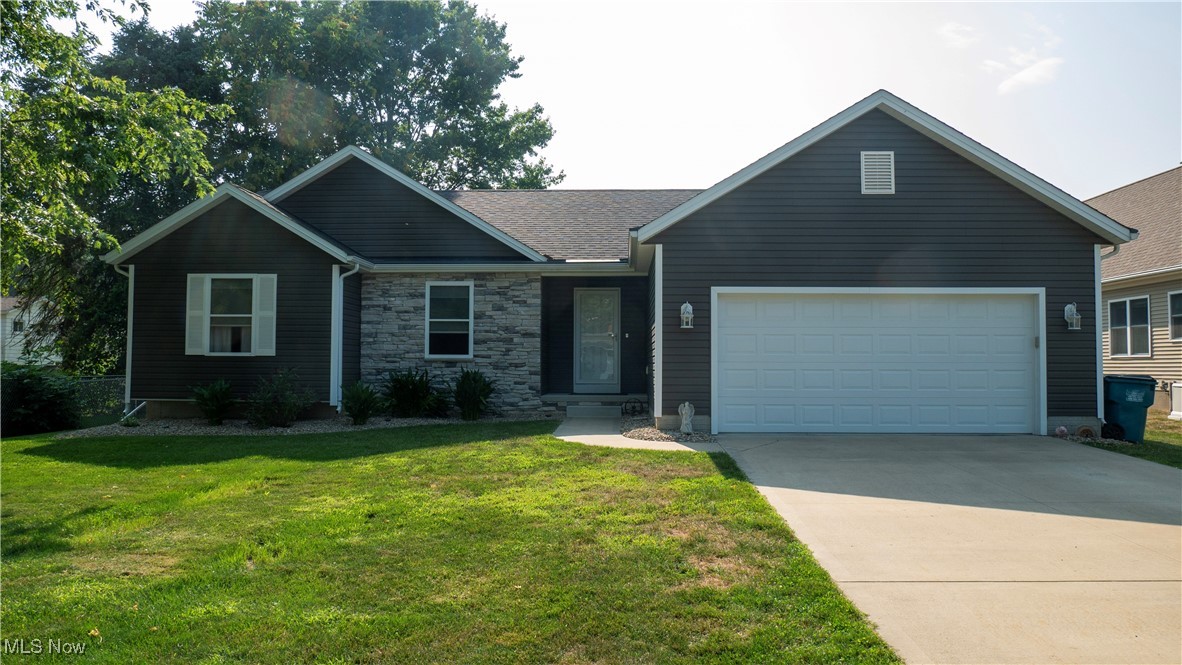 Better than new. This 6-year-old ranch offers a great open floor plan with 3 bedrooms and 2 full baths. Situated on a large deep lot, two car attached garage, and all appliances included. Refrigerator and washer and Dryer are just over a year old. The home boost a great room with gas fireplace, cathedral ceilings, and LTV flooring throughout. The eat in kitchen offer stainless steel appliances, granite counter tops, and sliding glass doors to the deck. The large deep lot is perfect for campfires, Garding and more. Home has Gutter helmet gutters. The house has large full basement, could be additional 1600 sqft of living, storage or both. House is ready to move in and offers one floor living at its finest. All This on a quiet street off the beaten path.