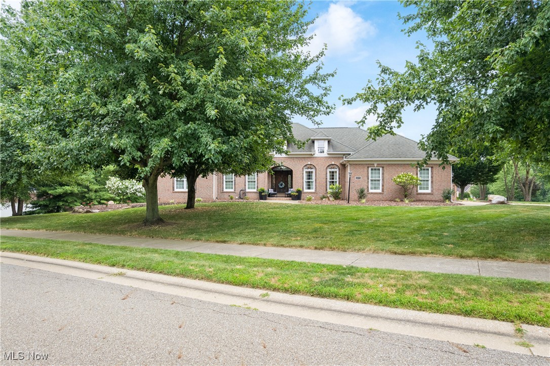 Is there a such thing as a perfect home- YES! Absolutely stunning, completely updated, sprawling home in Monticello! Do not miss this gorgeous ranch, featuring over 4300 square feet of living space, situated perfectly on a large corner lot. Home boasts a wide paved driveway, 3 car garage, and gorgeous landscaping, complete with a koi pond, patio and deck. Upon entering, you will appreciate the large open concept, beautiful hardwood floors, and pristine detail in every room. Home boasts a generous living room and a lovely gourmet kitchen complete with fine finishes, new stainless steel appliances, pantry, and lots of space for all your cooking and storage needs. The primary bedroom is grand in size, with a primary bath to match that includes double sinks, plenty of extra space, and a jetted tub. There are two other bedrooms on the main floor complete with another full bath. But just wait, there is so much more- downstairs, there is another full living space- complete with a full kitchen/pantry, recreational room, bathroom and more, with walk out access to the breath-taking patio view! The home's top to bottom renovations and impeccable decor make it warm and welcoming. The home is tastefully dressed and absolutely exquisite. Set up your private showing today.
The prestigious Monticello neighborhood includes use of the private pool, fitness center, tennis court, playground, and community Barnhouse.