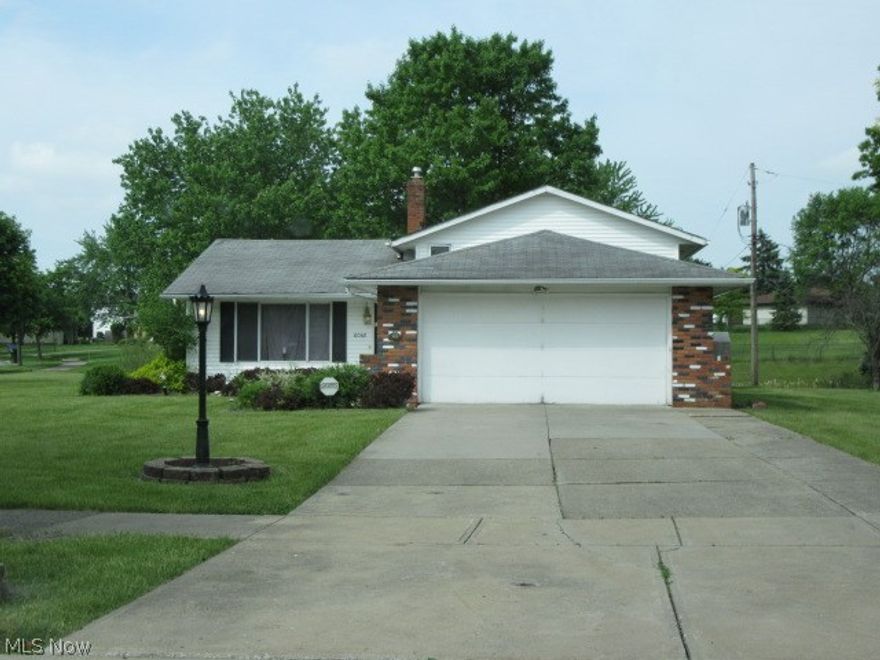 Sharp vinyl sided split level style home priced to sell!  Large corner lot with totaling nearly a half acre in property.  Private back yard with patio, storage shed and mature landscape.  Formal living and dining rooms.  Nice kitchen with oak cabinets and a stainless steel dishwasher.  Generous bedrooms sizes.  Modern bathroom.  Finished lower level with family room and additional half bath.  Hurry on this one!