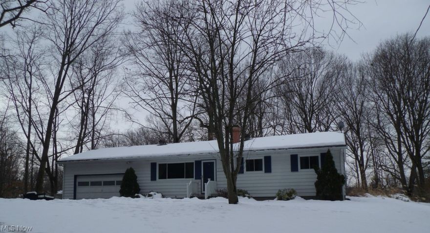 Looking for a slice of heaven in your own backyard? Then you have found it! Feeder Race canal and pond to the rear of this wooded lot. Wildlife abounds! New Maple Kitchen, new bath, new windows, entry doors. Pergo 25 year warranty floors over oak hardwoods. Tall full basement ready to finish with bath installed. Oversized attached 2 car garage 528 sq. ft.