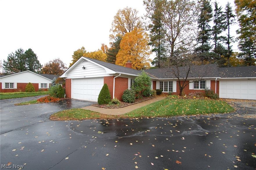 Fabulous 1444 sq ft Ranch-style Condo in Excellent Condition with an attached 2-Car Garage with attic storage; Landscaping; Sprinkler System; Open Floor Plan; large rooms; tiled Foyer with coat closet; formal Living Room with plush carpet, Crown Moldings, a Gas Fireplace flanked by built-ins on the left and a wet bar with built-ins on the right (both built-ins have doors for a clean tidy look), and French doors to a tiled 4-season Sun Room with ceiling fan, and two sets of sliding glass doors to a brick paver Patio; a formal Dining Room with crown moldings, chair rail, and plush carpeting; a large Kitchen with crown moldings, oak cabinetry, tile backsplash, appliances, laminate floors, double sink, and loads of cabinet space with pull-out shelves; a Half Bath; a Jack-n-Jill Bath that is shared between the Master Bedroom on the right and the 2nd Bedroom on the left; and a Laundry Room with a closet, fiberglass shower stall, a storage nook with shelving, furnace, and hot water tank. This