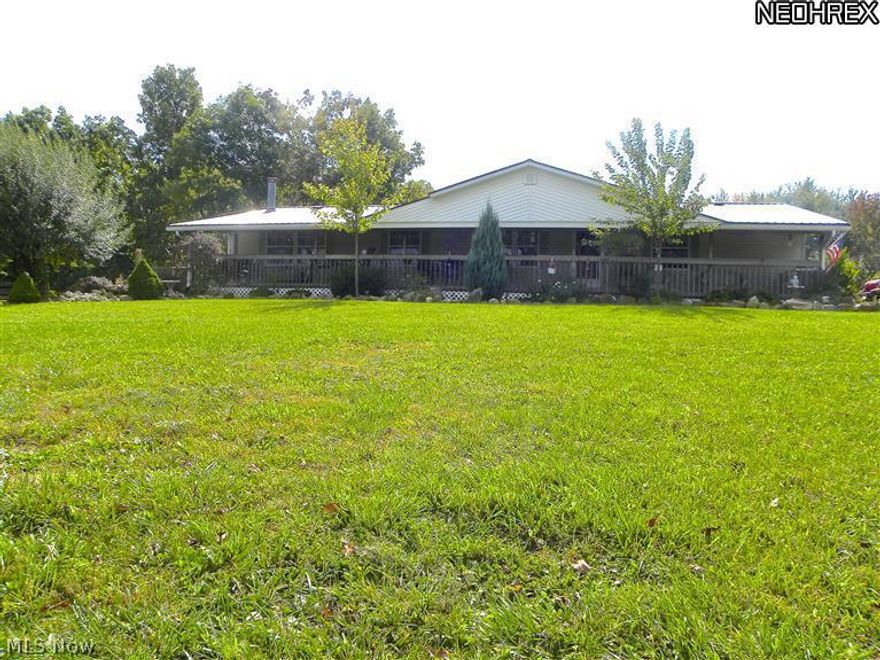 Lovely 3 BR, 2 BA Manufactured ranch home with a fantastic view. 20+ acres, partially wooded, partially tillable. Enjoy the large covered front porch while looking over the 10 acre frontage and viewing deer and turkeys. Master BD with walk in closet and bath with a garden tub. Skylights in Kitchen and Bath. Full basement attached to 1 car garage. Large wood burner, steel beams and high ceilings. Loads of room for workshops, machinery and ready to finish if desired. Another 1 car attached garage presently used as a party room gives this home loads of space for entertaining. New water conditioner, newer roof and laminate floors (2011). Beautiful landscaping and country views. Mineral rights do not transfer upon sale.