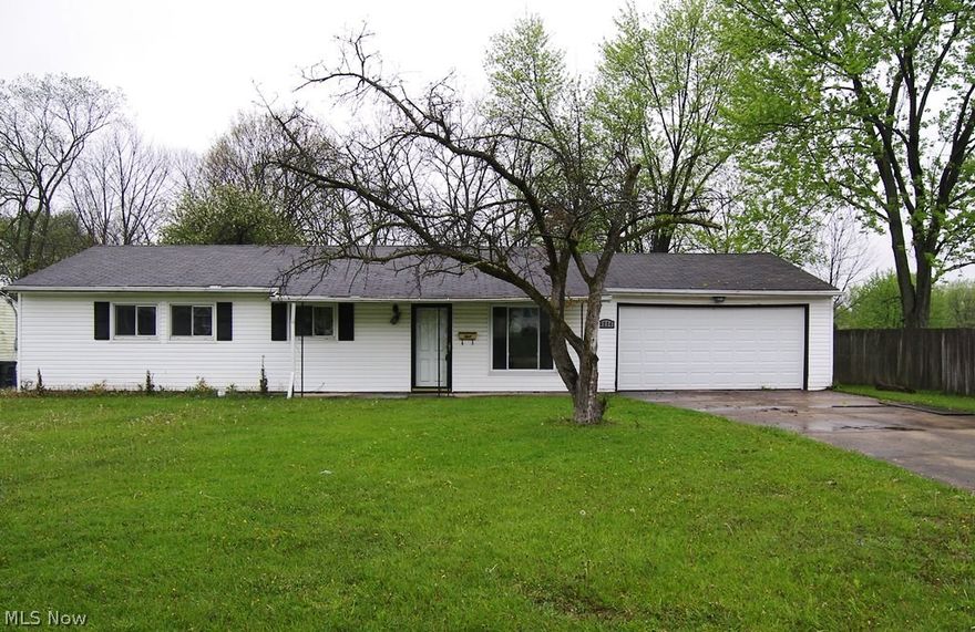 Great opportunity for easy one floor living on quiet cul de sac street!  You enter into the open living room and dining room which flows into the nicely updated kitchen.  Recent updates include range, dishwasher, maple cabinets, ceramic tile floor and counter tops. The laundry room is just off the kitchen.  There are four bedrooms and one full and one half bath, and both baths have been updated.  The private backyard offers a deck and fenced yard.  There is a 2 car garage with a door to the backyard.  The house does need carpet in the living room, dining room, hall and bedrooms but the price reflects this.  Come see this great opportunity!