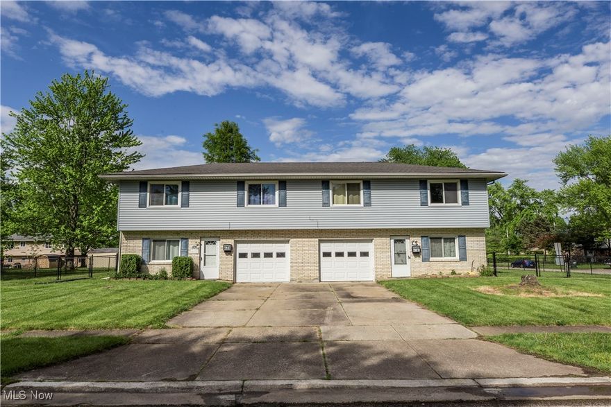 This exceptional turnkey duplex presents a highly profitable opportunity, with both units move-in ready and loaded with modern upgrades. Ideal for owner-occupants, investors, or multi-generational living.
Right Unit – 2 Bed, 1.5 Bath. Freshly painted and new flooring throughout, spacious family room with new LVP flooring and generous closet space, fully remodeled kitchen with soft-close cabinets, built-in dishwasher, garbage disposal, and modern finishes with ample cabinet storage and built-in butcher-block sideboard, updated bathrooms with stylish touches, LVP tile in the kitchen and living area, tile flooring in the laundry room, dedicated 1-car garage with opener, private whole-house A/C system with NEST thermostat. Appliances included: Washer (1 yr old), dryer, stove, refrigerator, and dishwasher.
Outdoor features: Large raised deck and covered concrete patio—perfect for spring days and family BBQs
Left Unit – 3 Bed, 1.5 Bath. freshly painted and new flooring throughout with spacious bedrooms and large closets, modern kitchen renovation with trendy white cabinetry and new LVP flooring, Upstairs bathroom completely remodeled: walk-in shower with ambient lighting, new fixtures, downstairs half-bath updated with new sink, toilet, and medicine cabinet, major upgrades: Tankless hot water heater and new furnace, private whole-house A/C system, outdoor space mirrors right unit, raised deck and covered concrete patio, appliances included: Washer, dryer, stove, refrigerator, dedicated 1-car garage with opener.
Shared Outdoor Space
0.38-acre lot with a fully fenced backyard (w/3 gates), patios separated by a shared shed, located on a quiet no-outlet street.
This income-generating property is located in Stow, a city known for its excellent schools. It's conveniently close to both Kent State University and The University of Akron, making it attractive to young professionals and families.