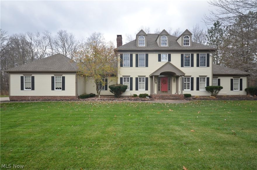 Immaculate & updated Ken Payne true 5 bedroom colonial w 1st floor master in Canterbury! Big tickets updated-’14 Dimensional Shingle Roof, Skylights, A/C. ’08 Furnace. Stately marble foyer w Parisian crystal chandelier, wainscoting & oversized crown molding- flanked by a spacious hdwd liv rm & formal dining rm w hdwd, crown, chair rail & Parisian chandelier. Sprawling cathedral kitchen w hdwd, granite counters/backsplash, massive island w breakfast bar, dual over, Jenn-Air, eating area & brick floor to ceil 2 sided fireplace. Open to the cathedral sun rm w hidden wet bar & access to deck w built in seating & patio- great for entertainment! Nearby ½ bth tile floor & spacious 1st flr laundry  w marble floor & tons of built ins. Fam rm w brick fp, built ins, bay window & hdwd flr. Additional ½ bth w hdwd floor, executive office w custom wood walls, dentil molding, built ins & bay window plus French doors to liv rm. 1st Flr Mst suite is giant w a massive glam bth – jetted tub, rain shower