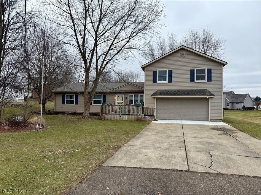 Wonderful split-level home in the desirable Dee Mar subdivision! Tucked away on a quiet cul-de-sac, this spacious 4-bed, 2-bath home offers comfort, functionality, and endless potential. The main level features a bright living room, dining area, kitchen, first-floor laundry, three generously sized bedrooms, and a full bath. A new roof has been installed on the main portion of the house for added peace of mind. A standout feature is the impressive two-story garage addition, which includes a stunning great room with soaring ceilings and a cozy gas fireplace. Upstairs, you'll find an amazing owner’s suite complete with a large bedroom, ample closet space, a dedicated tanning room, a full bath, and convenient walk-in attic storage. The home is equipped with two gas furnaces, and the attached 2-car garage is well-insulated. Outside, enjoy a level partially fenced yard with a large storage shed—perfect for hobbies, gardening, or extra storage. Located just 5 minutes from Ohio State Route 77, this home is in great shape and ready for its new owners!