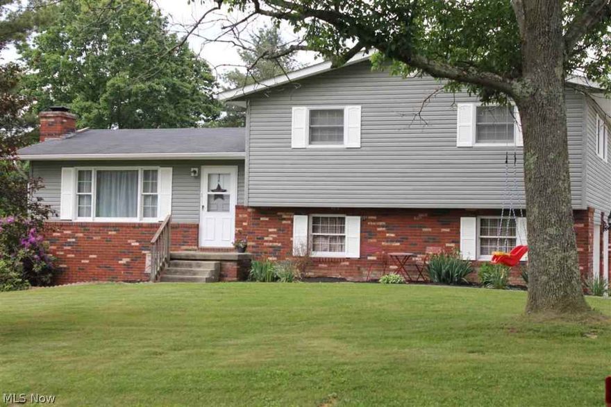 Updated tri-level in a country setting. Ready to move into. Tastefully decorated on nearly an acre to roam. Finished basement area includes wood burner and a flat screen on the wall. A must see!!