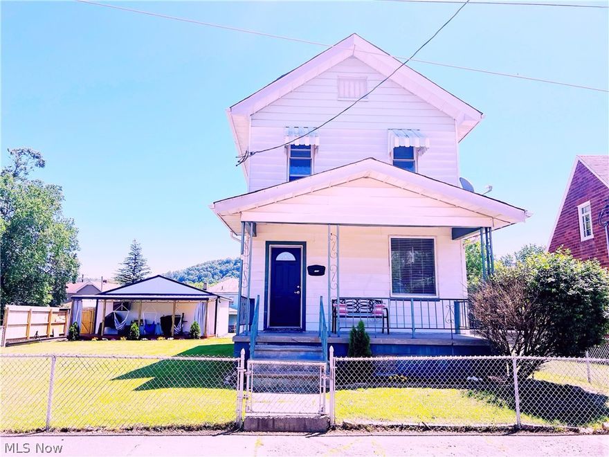 Welcome Home to this Adorable remodeled 2 story!  This home features a level double lot that is completely fenced in and a 2 car detached garage!  Large back deck is perfect for entertaining. Covered patio off of garage is such a positive, peaceful, unique space- with its individual hammock chairs, lights, and curtains for privacy or shade. Feel the warmth upon entering this bright and cheerful home that has undergone a complete transformation.  I absolutely love the coffee nook with bold contrast.  The completely updated kitchen features a farmhouse sink, butcher block countertops, new window, gas stove, microwave, and dishwasher.  The Wood planked ceilings are striking and glisten with the recessed lighting illumination throughout.  Upstairs is where you will find your 3 bedrooms and full bath. The current owners decided to keep the beautiful window in the bathroom that nostalgically maintains  the character of this home beautifully. Downstairs is a carpeted bonus room that can be utilized as a family room, office, playroom, etc. This room has newly installed windows as well.  There’s a time when you enter a home that you feel the love and care that went into every thoughtful upgrade. This home is exactly that.  If you are ready to RELAX on your new patio and curl up to a good book with your favorite beverage? -or- Entertain friends and family with a perfect spot for a get together?  You will find this home a perfect fit. Location is less than 35 miles to Pittsburgh international airport.  From sellers: Furnace and Ac Unit had a check up within the last 6 months. Roof approx. 8 yrs old.