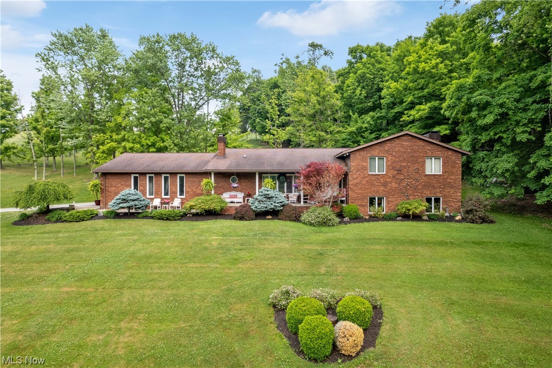 With spring and summer right around the corner, you don't want to miss out on your opportunity to own this beautiful home!! Make a splash this summer with friends and family in the pool, and then spend the long, warm evenings on the captivating rear patio cooking out and making memories. With over 3+ acres, this BRICK home also features 3-4 bedrooms, 3 1/2 baths, a huge open kitchen/dining room combo, multiple living spaces, & an attached oversized 2-car garage. The bathrooms have been recently updated, a new septic system installed, a new electric panel installed and the house has been meticulously maintained for the last 40+ years. With all this home has to offer and a great location, schedule your appointment today!! Don't let this home slip away.