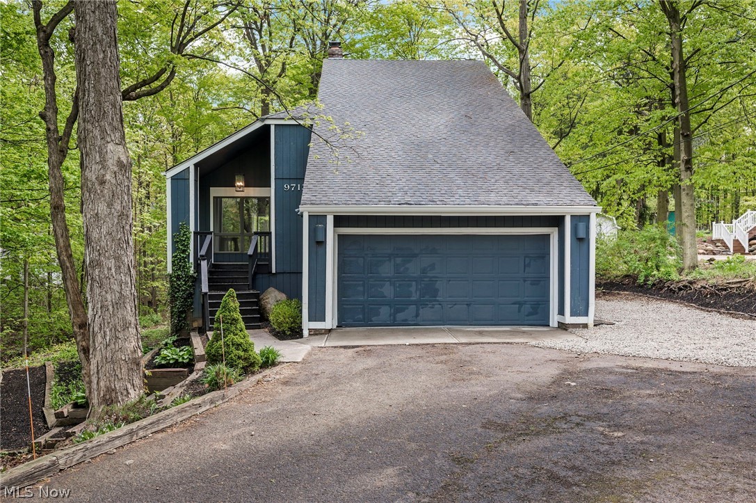 Welcome nature enthusiasts! Explore this expansive 2200-square-foot, 4-bedroom, 2-bathroom residence nestled on a stunning one-acre lot, offering breathtaking panoramic views of the creek and a secluded wooded backdrop. Enter the vaulted living room, complete with a charming fireplace and sliding doors that open onto a spacious deck. The sizable eat-in kitchen, accompanied by a cozy dinette, is ideal for hosting gatherings. For more formal occasions, dine in the elegant formal dining room. Retire to the luxurious 20x15 master suite, complete with its own private bath. Descend to the lower level, where you'll find a sprawling 20-foot family room boasting a second wood-burning fireplace in the fully finished walk-out basement. Prepare to be captivated!