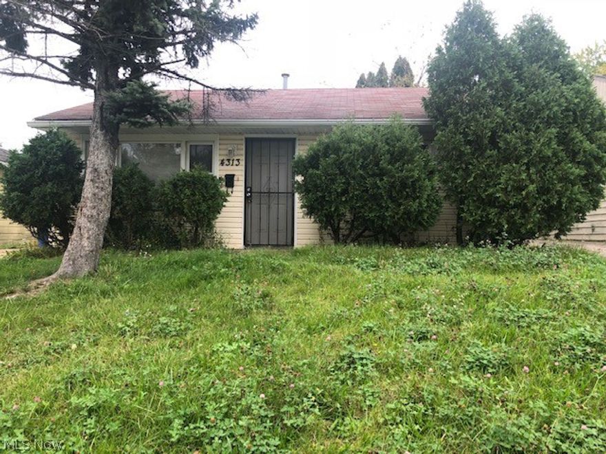 Cozy three bedroom, one bath ranch situated near Miles Ave. Spacious living room w/carpet, home painted neutral gray tones. Kitchen remodeled 2016 with slate flooring, newer wood cabinets and countertop. Ground floor laundry off kitchen, spacious bedrooms with plenty closet space. Updated bathroom with white cabinetry, newer commode and vinyl flooring. A must see, great investment property!