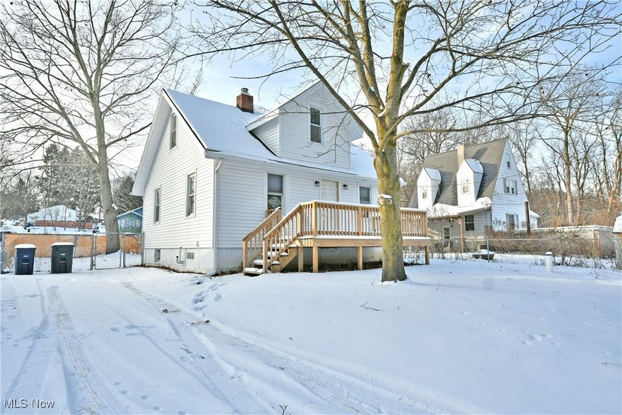 Find your peace away from the city while still being just minutes from the action and attraction! Welcome home to this cozy Akron residence, tucked away along a low traffic, dead end road; ready to provide you with the serenity you deserve. The three-bedroom Cape Cod style layout has been recently updated from top to bottom and beckons with inviting, move-in-ready living space. From the outside, a raised front patio is a perfect place to relax while a fenced-in backyard is perfect for pets or general security alike. Step inside to find an expansive frontal great room, showcasing plush carpeting that continues throughout the residence. Recessed overhead lighting joins the multiple windows, aiding in illumination with plenty of natural light. An impressively sized kitchen spans rear walls with long running countertops and an array of cabinets for simplified storage. The first-floor master bedroom completes the level as carpeted stairs rise from the opposite end of the kitchen. Upstairs, two additional bedrooms join both a brightly lit full bath and partially finished attic storage. Utilities and yet additional storage are located within the basement level.