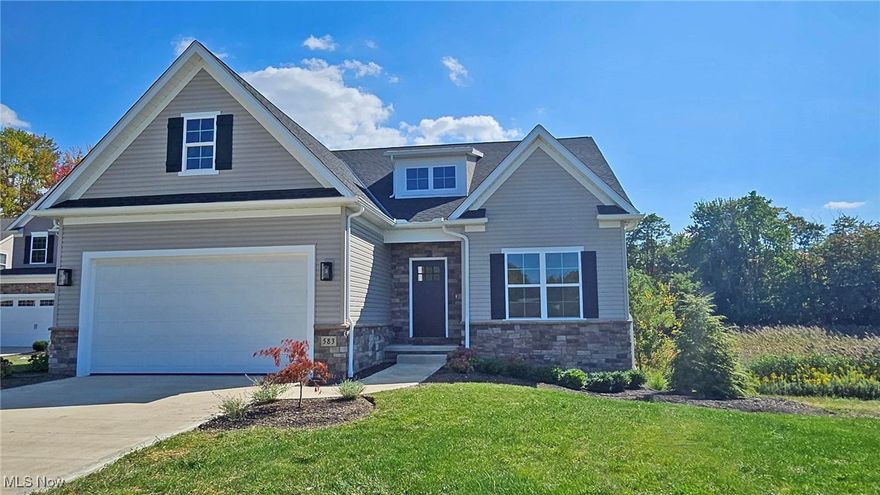 Brand New Simcon Homes Masterpiece with First-Floor Master! Welcome to this beautifully designed and meticulously crafted cluster home by Simcon Homes, styled perfectly for today’s lifestyle. With an open, airy layout and plenty of natural light, this home offers comfort, style, and convenience throughout. The expansive great room features a beamed cathedral ceiling, gas fireplace with decorative mantel, and a dry bar with floating shelves—ideal for entertaining. The great room flows seamlessly into the bright white kitchen, which boasts a large center island with an eating bar, tile backsplash, and modern appliances. The adjacent dining room provides ample space for gatherings, and just beyond is a covered composite deck with views of the serene green space. The first-floor master suite is a true retreat, featuring a tray ceiling, decorative accent wall, and a spacious walk-in closet. The spa-like master bath includes double sinks, a makeup vanity, a custom tiled shower, and a linen closet. Additionally, the main floor has a laundry room with a walk-in closet, a back foyer with a convenient sitting bench, and a full bath next to the fourth bedroom or office. Upstairs, you’ll find two generously sized bedrooms and a full bath. The unfinished walk-out lower level is ready for your personal touch and offers endless possibilities, with a rough-in for a full bath and plenty of natural light through large windows and sliding doors that lead to the backyard. Situated on a quiet cul-de-sac and just a short drive to shopping and restaurants, this home is move-in ready. Don't miss your chance to make this stunning new home yours!