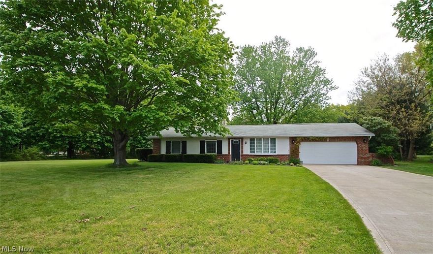 Everything has been completed in this three bedroom, 1.5 bath Ranch home.  Nice open flow, great for entertaining with Brazilian Mesquite floors and new lighting throughout.  Remodeled kitchen in 2010 with beautiful granite counters, stainless steel appliances, LG exhaust fan, full Travertine backsplash as well as Travertine 24" tiles, new cabinets, added kitchen pantries, vaulted family room with wood beam along with new Low E windows and doors, furnace & A/C, hot water tank, all new bath fixtures, vanities, toilets, and flooring.  Beautiful cedar lined closets in the master and two in the hallway.  This home has everything you could hope for in a three bedroom. For your outdoor enjoyment there is a gorgeous large back yard with an outdoor patio, garden, and beautiful landscaping.  New siding and real stucco front completed in 2012.