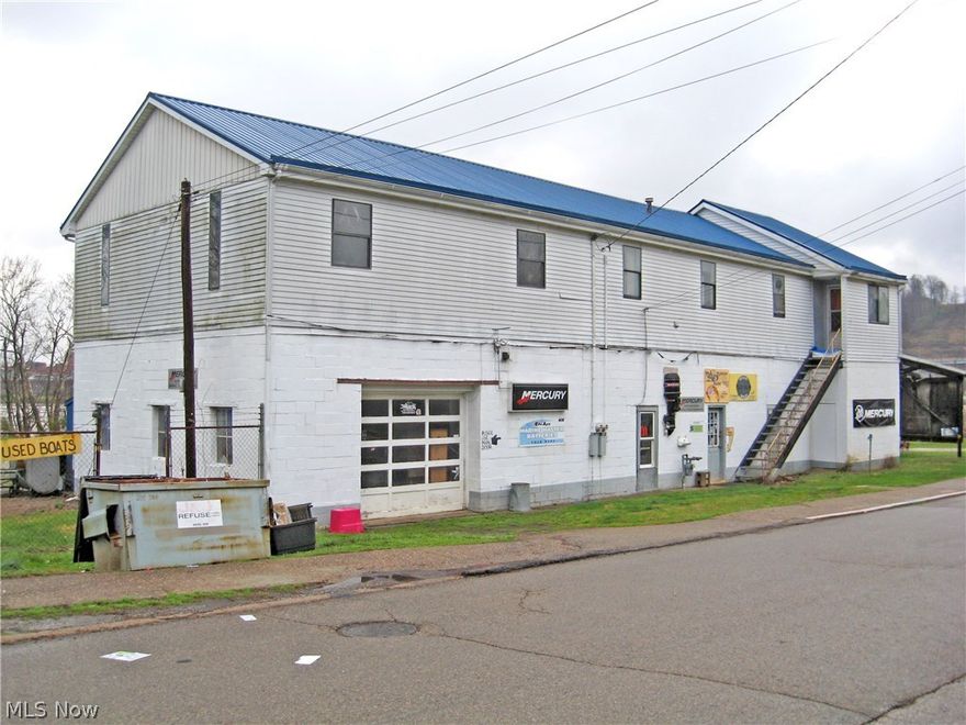 This property is at end of Walnut Street in Belpre Ohio formerly known as Dave’s Marine plus other surrounding property ...Beautiful location made up of multiple parcels of property made up of different sizes and shapes.  There are some riverfront and river view parcels included. They can be bought all together or separately ..there is a concrete block building with an apartment above it.   Facing Blennerhassett Ave.is the historic Druse Hotel on one parcel of property.  This property is in the 100-year floodplain.  There are 3 parcels that front the river on Blennerhassett Avenue or Walnut Street that is zoned R2, suitable for single or multi-family dwellings.  The majority of the property is in ta C3 zone that allows only for Marina, or river-oriented types of development (boat docks, parks & beach areas, etc.)  More info is available from the city of Belpre.  The C3 property includes a concrete block & frame constructed building currently used as a marina.  The business does not go