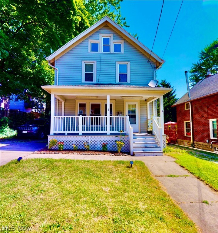 Welcome to this beautiful 3 bedroom, 1.5 bath colonial located in the heart of Cuyahoga Falls! Complete with a covered front porch, detached 1 car garage and a rear deck that is perfect for relaxing or entertaining. The first floor features an updated eat-in kitchen with a large island, laundry room, half bath, and new flooring throughout. The second floor includes all 3 bedrooms and an updated full bath. The finished attic can be used as a bonus room as well! This home is located only a few houses down from the Cuyahoga River, less than half a mile from the Gorge Metro Park, and minutes from Front St and Chapel Hill shopping/dining.