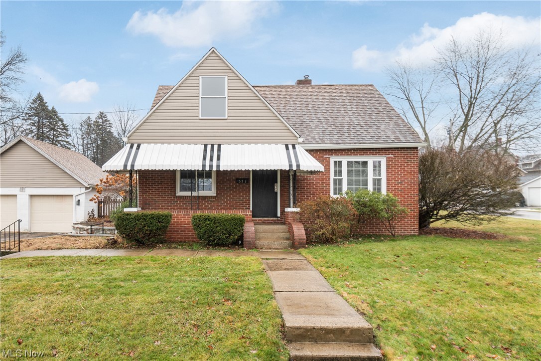 Welcome home to this adorable brick cape cod situated on a double lot, totalling over 1/4 acre! The kitchen has been completely renovated with quality cabinetry, soft close drawers, granite counters, a tiled backsplash, LVT flooring and stainless appliances, including a built-in beverage refrigerator! An arched doorway leading into the spacious living room adds to the charm. Two bedrooms and a remodeled full bath complete the 1st floor. A massive 3rd bedroom is located on the 2nd floor and has a gorgeous, updated en suite bathroom with a walk-in tiled shower! The walk-out basement is partially finished and has plenty of storage space. A covered back patio overlooks the fully fenced back and side yard and the oversized 2 car garage offers all of the outdoor storage you will need. A long list of updates and upgrades were all completed in the last 4 years!