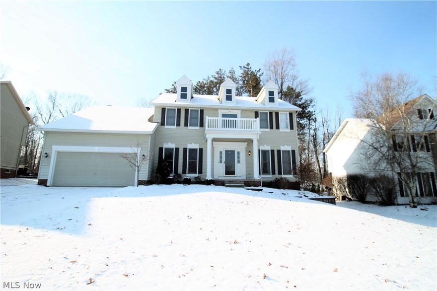 This stunning colonial has so much to offer. It offers 2,478 square feet, four bedrooms, and three and a half baths. As you enter through the front door you are greeted by wood floors, living room, dining room, office and elegant simplicity. The kitchen offers granite counters with tile backsplash, abundance of cabinets with lighting underneath, stainless steel stove and microwave. The kitchen also includes an island, built in desk and is open to the eat in kitchen area which has sliders to the attached back deck. The family room is open from the kitchen and has a large window that offers plenty of natural light to shine through. The first floor laundry room and half bath which has been updated with granite counter, completes the first floor. As you go upstairs you will find four large bedrooms with large closets. The master suite has vaulted ceilings and includes the master bath which has two sinks, large garden tub, walk in shower and great size walk in closet. The upstairs also has