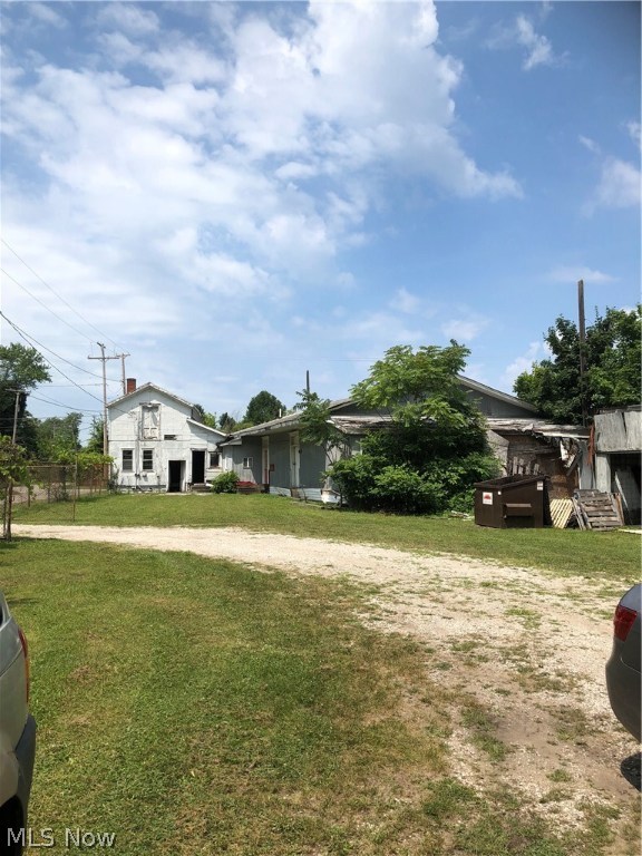 Here's your chance to own a commercial property, conveniently located on Harbor Street, in Conneaut, Ohio. The property includes a 34' x 56' Pole Barn with 20' x 40' lien too. Pole Barn has metal siding, metal roof, garage doors (updated in 2016) and electrical service. Property is completely fenced in -- plenty of room to store your toys, boats, or cars or run an automotive or construction business. Motivated Seller. Entertaining all offers!