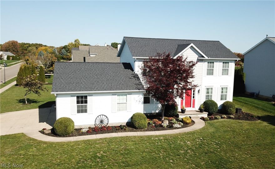 Welcome to 2389 Fairchild in the sought after Hoover Estates Neighborhood in Lake Twp! This 4 bedroom, 2.5 bathroom colonial sits on a spacious corner lot and is ready for you! All 4 bedrooms are on the second floor including the master suite with updated bathroom featuring a custom subway tiled shower and walk-in closet! Fabulous first floor which has been updated with architectural hardwood throughout and white painted trim. Large family room running the full depth of the house with a stone gas fireplace in the corner. Large living room opens to the eat in kitchen with a slider to stamped concrete patio. The patio is lined with retaining wall pavers and creates a perfect space for hosting parties or relaxation! Backyard is spacious and includes a giant swingset which will convey. Spacious kitchen, dining room, half bathroom and laundry room with utility sink and coat/shoe storage complete the 1st floor. The basement is finished is currently being used as an office, playroom, theater