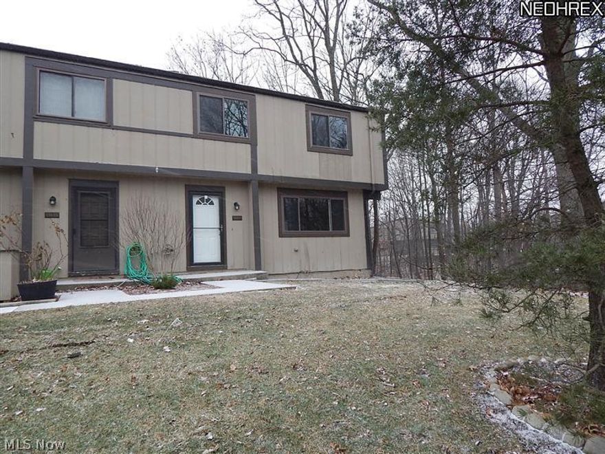 Absolutely stunning, totally remodeled 3 bedroom townhome in Harbour Light*View overlooks ravine & woods*Everything was gutted and replaced including floors, cabinets, counters, furnace & A/C, baths, appliances & more*LR with hickory floors*Gourmet kitchen with hickory cabinets, grantite counters, stainless steel appliances & ceramic tile floors*1st floor laundry w/ceramic tile floor*Half Bath with pedestal sink & ceramic tile floor*Upstairs there are 3 large bedrooms, 2 with double closets*Huge hall closet in upstairs hall*Brand new carpet throughout*All doors inside & front door as well as all windows have been replaced*Lower Level has finished rec room & storage & laundry areas* New hi efficiency furnace, new hi efficiency 50 gallon hot water tank*Patio*New heat pump*1 car garage*This building will be resided & new roofs installed Spring 2014*Move in to a literally Brand New condo*Very Private Setting*Walking distance to pool