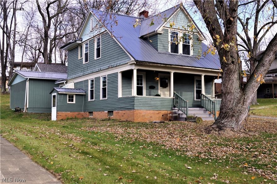 Immediate Possession and Move-in-Ready on this adorable home in the "Heart of Minerva" on "Hart Ave."!
This 3 bedroom, 1-1/2 bath home has many  very nice renovations! Newer metal roof and windows on house and garage, newer overhead garage door. House is all freshly painted inside and out. All newer flooring throughout. Beautiful new kitchen within the last year. Large formal dining room. First floor utility/laundry room doesn't currently have washer/dryer hook up but would be very easy to do. 1/2 bath on the main level. Beautiful wood staircase leads to 3 bedrooms and full bath upstairs. Full basement with high efficiency gas furnace. All new plumbing within the last year. 24x30 detached garage with electric. Situated on 2 parcels.