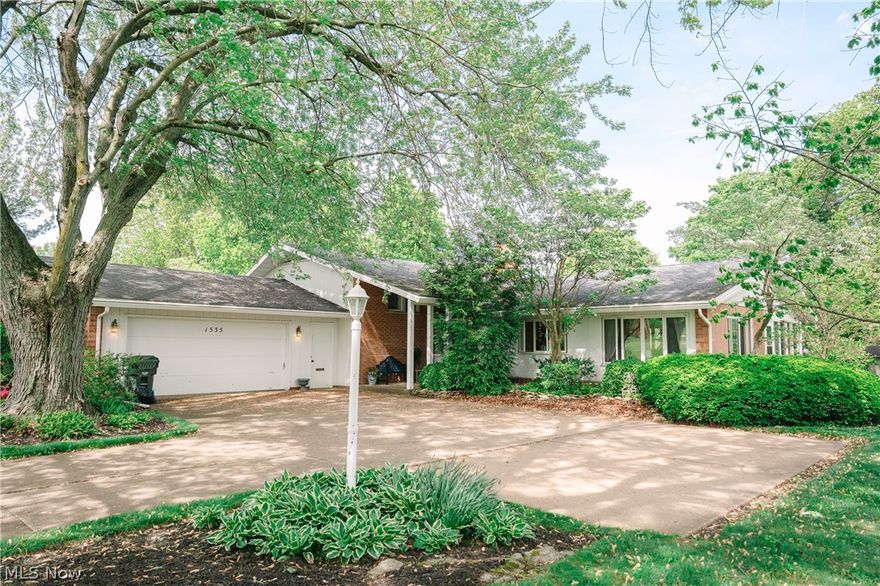 Wow!  Custom home in one of Orrviille's most desirable neighborhoods.  This FOUR bedroom, 3.5 bath home has so many incredible features.  Large driveway and inviting front porch.  Impressive two story foyer, great room with two focal points- the large window overlooking back yard and the fireplace!  The rest of the first floor is just as impressive with a four season sun room, dining room with two large windows, an updated kitchen with quartz counters, a coat closet and half bath.  This house has a large footprint and ample places to spend time with extended family and friends or to entertain guests.  The upper level has a large landing area that could accommodate a reading nook, desk, or a music area (currently where they keep their piano).  In addition, there are four large bedrooms and two full baths.  The lower level has another focal fireplace in the oversized family room, potential wet bar, a full bath, access to the two car garage and sliding glass door to the concrete patio.  This level is also set up for a kitchen if one would choose to do so.  The fourth level contains a basement with ample space for storage or even a pool table or ping pong!  The backyard is a great place to sit on your patio for dinner or coffee, have a garden like the owners did for years, or just enjoy being outside.  This is an incredible home, in a wonderful location, with a lot of natural light, custom features, and lots of square footage!  Make your appoinstment to see this home today.