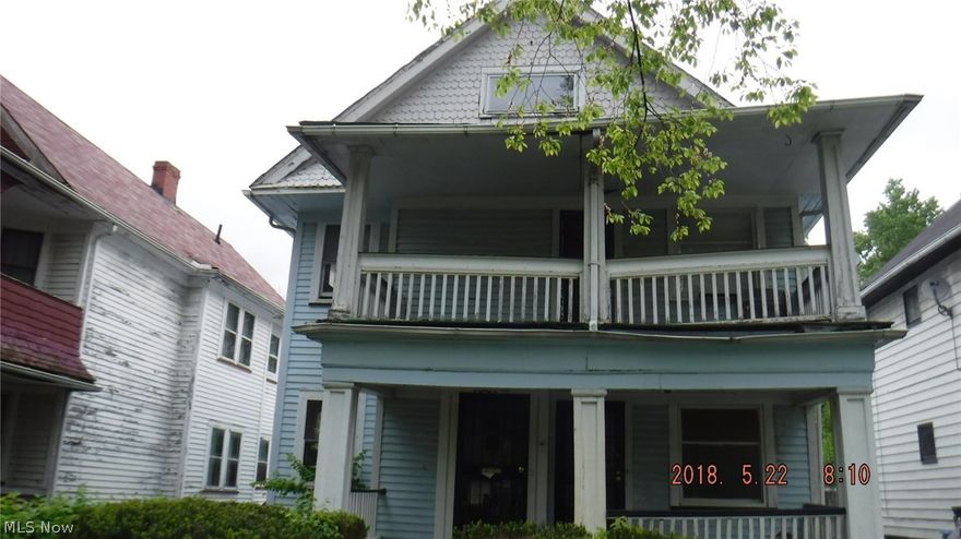 Investment opportunity with two bedrooms in each unit plus an additional 3rd floor.  Close proximity to Shaker Square!  Sold as is.