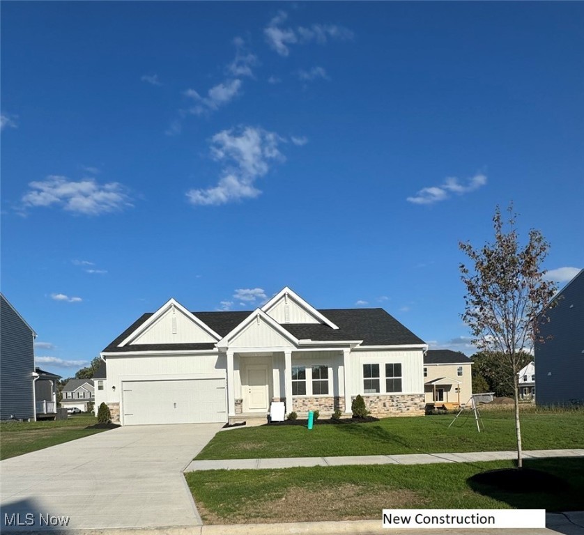 Brand-new construction without the wait! This beautiful ranch is ready now and can close in as little as 30 days, letting you enjoy lakeside living before the holidays. Step inside to discover 3 bedrooms plus a home office, 2 full baths, and a bright, open-concept layout designed for easy one-floor living. The spacious great room flows seamlessly into the chef’s kitchen featuring a massive 8-ft island, quartz countertops, 42” soft-close cabinetry, and a walk-in pantry. Convenient first-floor laundry makes daily living effortless. All upgraded GE Profile smart stainless-steel appliances are included! The primary suite is a relaxing retreat with a luxurious ensuite bath boasting a 5-ft tiled walk-in shower, dual quartz vanity, and generous closet space. A split-bedroom design provides privacy for family or guests. Located just a short bike or golf cart ride to downtown Vermilion and minutes from marinas, golf, and dining—this home delivers the lake lifestyle you’ve been dreaming of. Special financing incentives and flex cash available—contact us today!