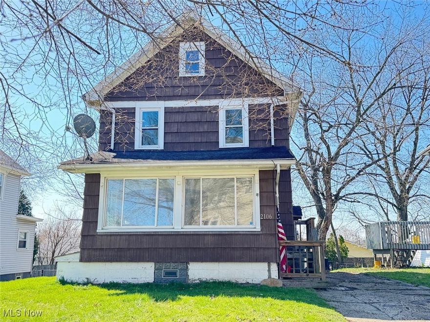 Great starter or turn-key investment opportunity. New carpet and paint throughout. Updated kitchen with oak cabinets and nice appliances. Attic can be 5th bedroom or bonus room. Nice large rear yard with walk-out basement.